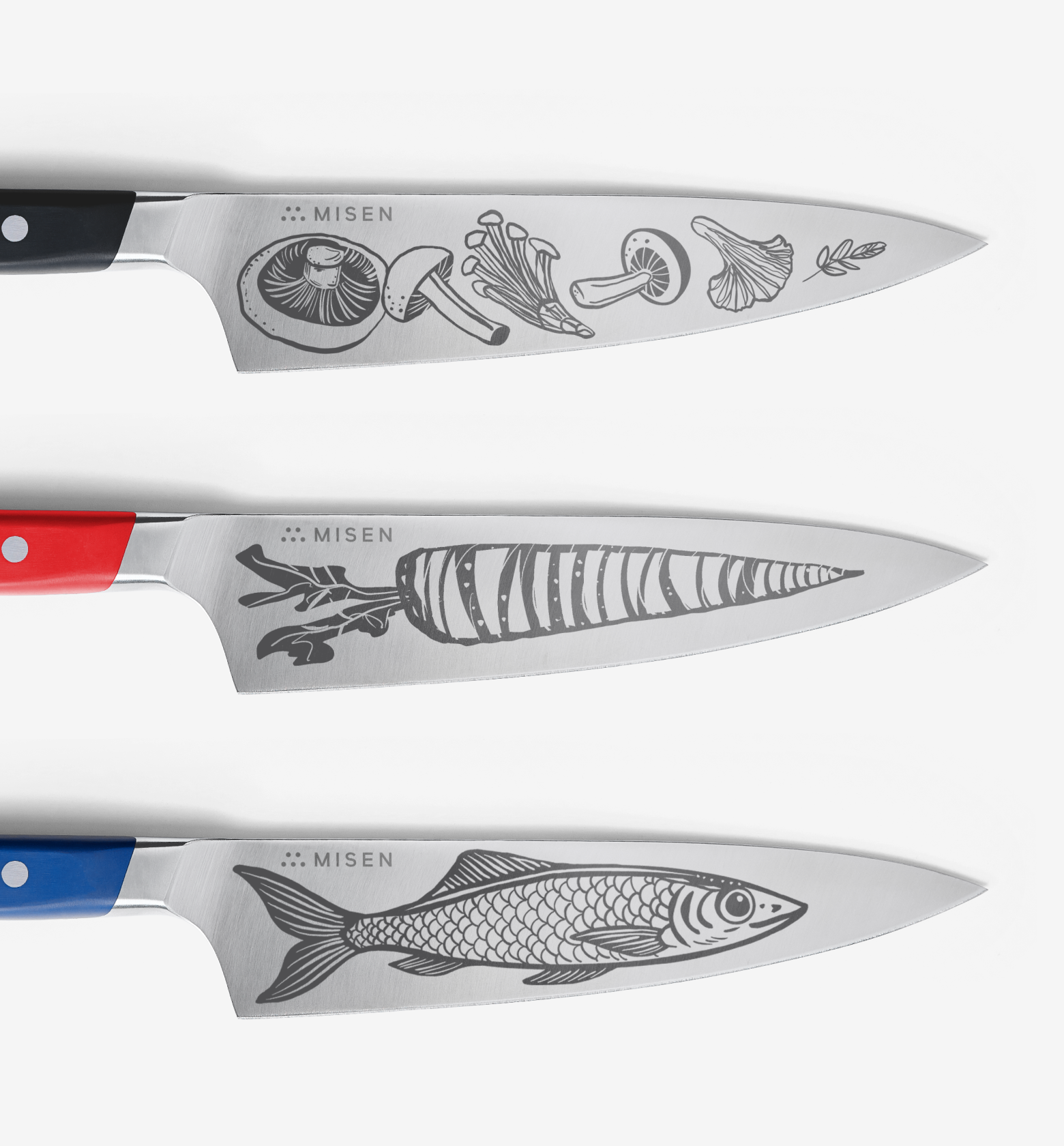 Misen kitchen knives with engraved mushroom, carrot, and fish illustrations on steel blades